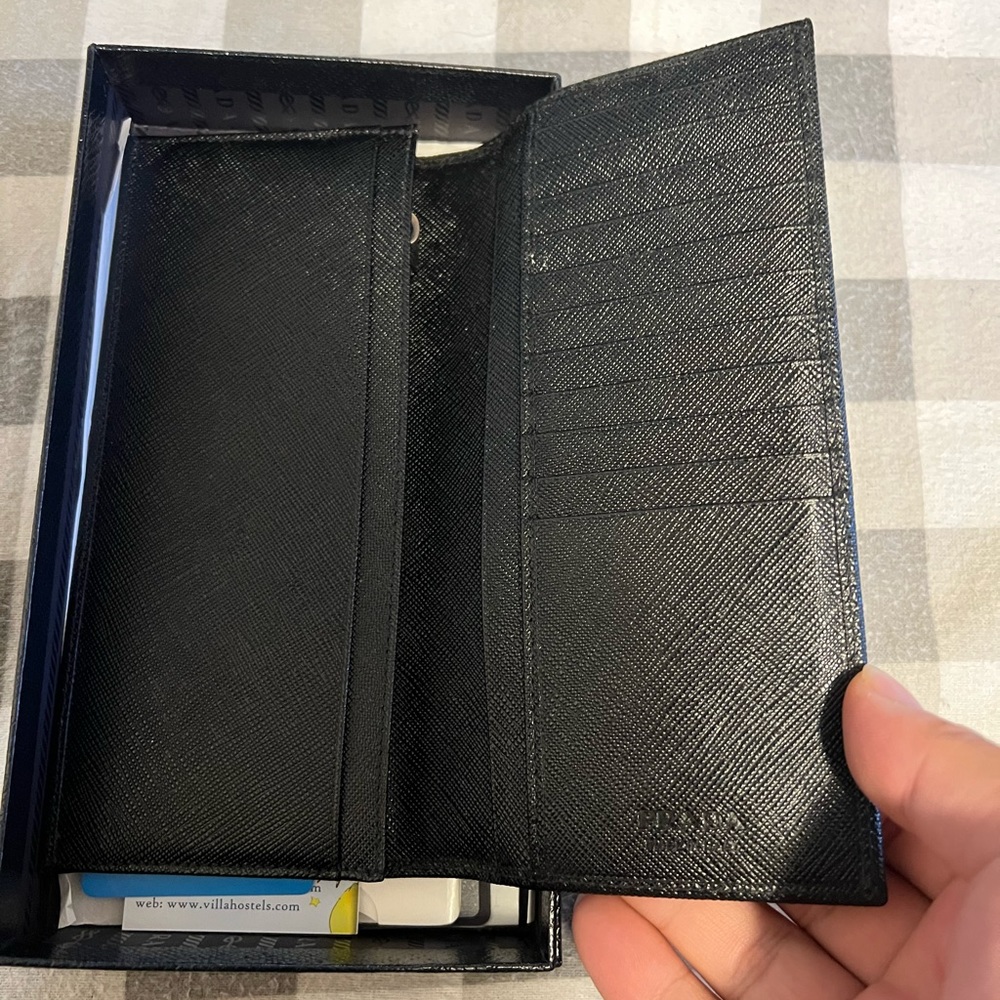 Like new (used less than 5 times) Prada Portaf. Vertical Wallet